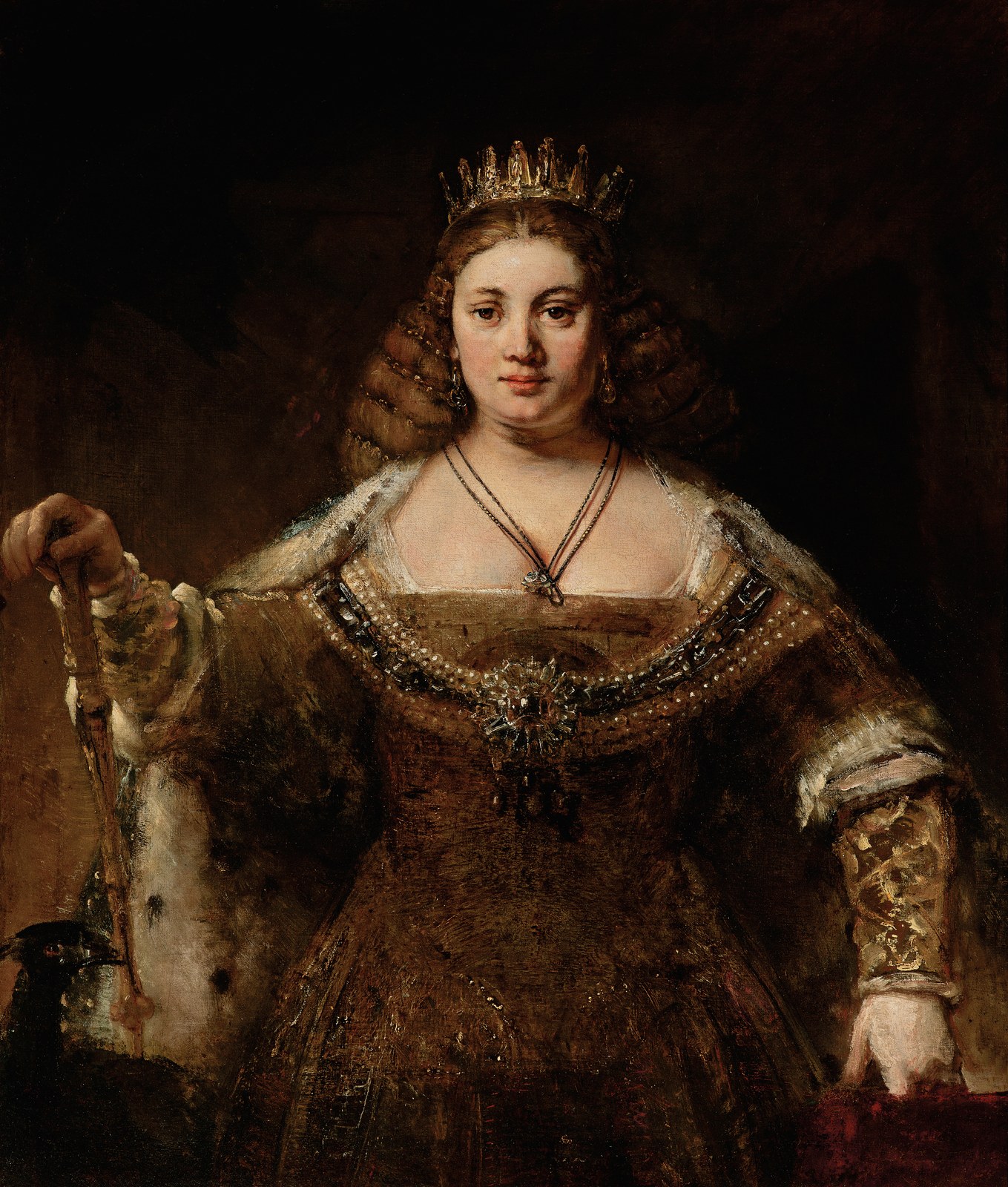 Rembrandt's painting of Juno, queen of the gods, crowned and in a jewelled gown, holding a sceptre.